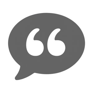 Icon of a Gray speech bubble with white quotation marks inside stylized graphic no text